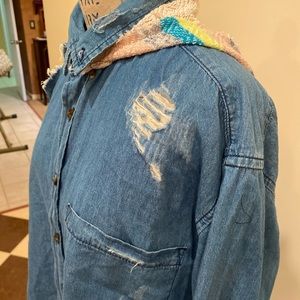 Altered denim shirt.